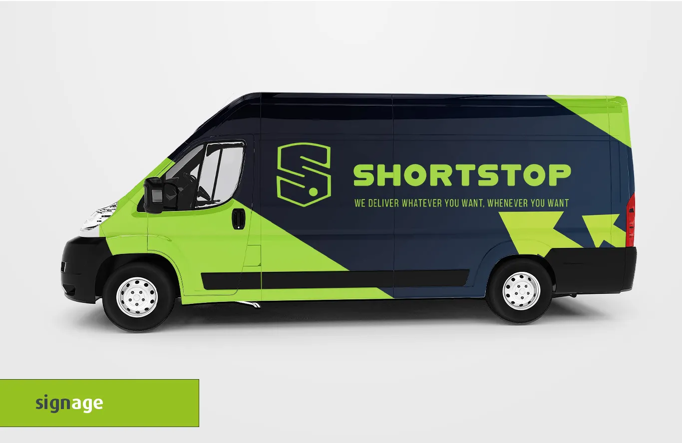 Brand-Design-Concept-Shortstop-Signage A green and black delivery van with the text "SHORTSTOP" and a tagline "We deliver whatever you want, whenever you want" printed on the side. The van features a geometric design and an iconic "S" logo. A green label at the bottom left corner reads "signage.
