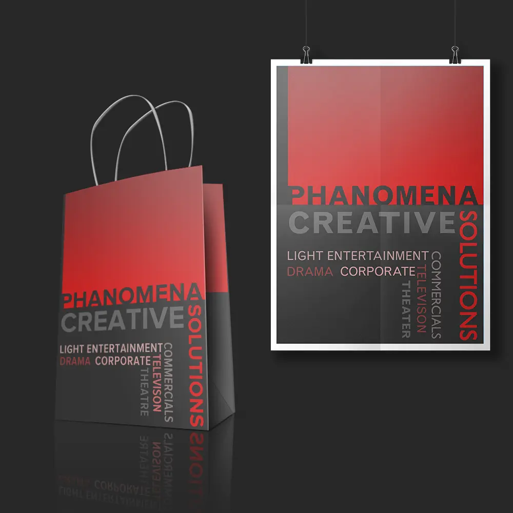 A poster and a shopping bag with a red-to-black gradient background showcase "PHANOMENA CREATIVE SOLUTIONS" in prominent letters, listing services like light entertainment, drama, corporate, commercials, television, and theatre. This sleek merchandise design illustrates the brand's comprehensive offerings.