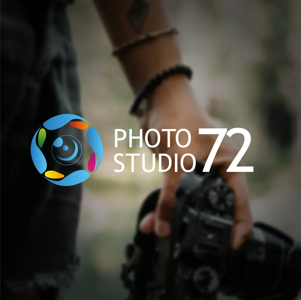 A person's hand is holding a camera, capturing the essence of "PHOTO STUDIO 72," displayed prominently in white text on the right side with a colorful circular logo on the left. The background is blurred, focusing attention on the hand, camera, and cohesive visual identity.